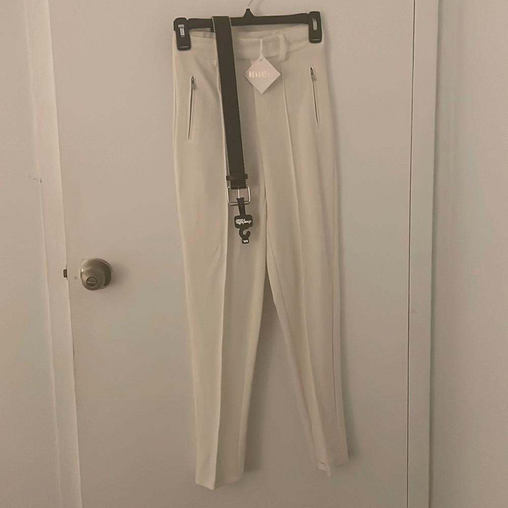 Cream colored tapered pant with belt Never worn.